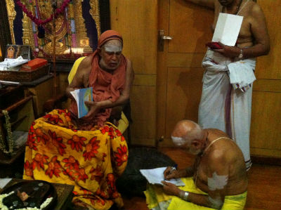 Swamiji dictating the blessing message